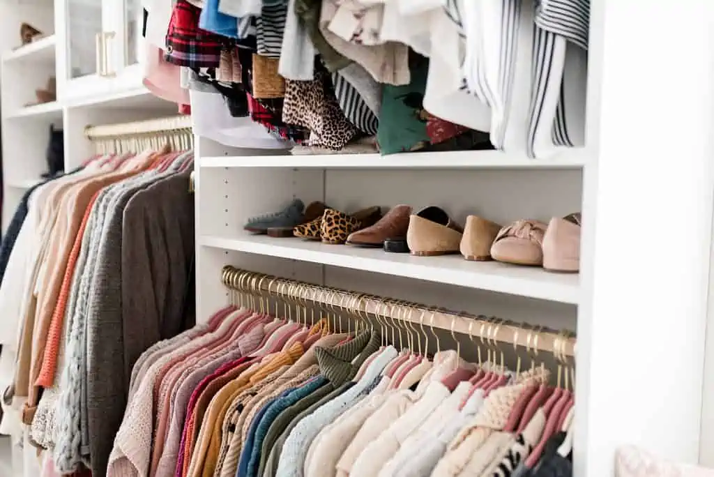 california closets custom walk in shoe and shirt section