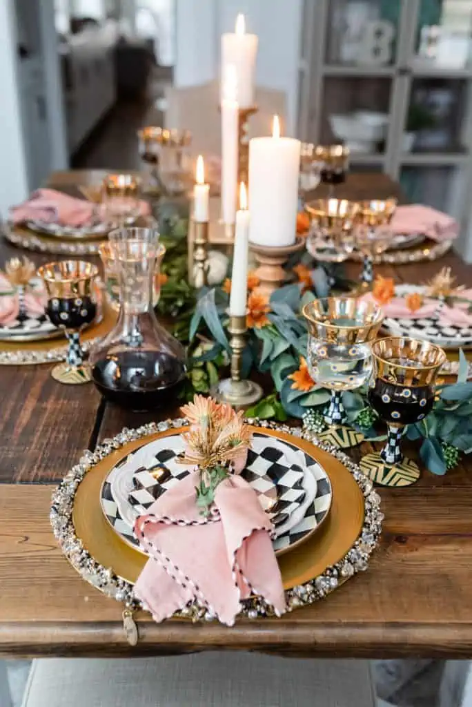 mackenzie-childs table setting with candles