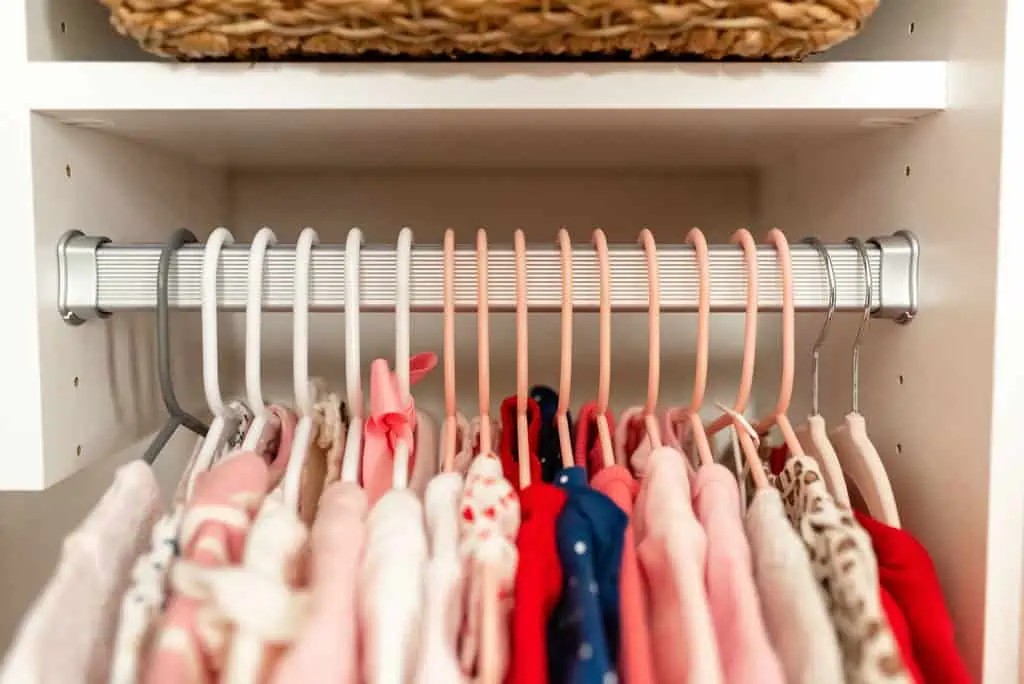 hanging rack in baby nursery closet